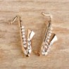 Saxofone de cristal dourado - broche