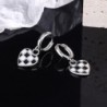 Round earrings with hanging check heartEarrings