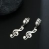 Brincos compridos com notas musicais