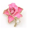 Flor com cristal/pérola - broche dourado