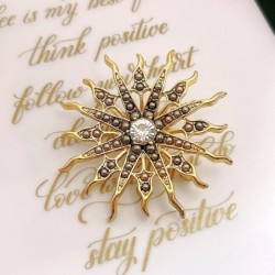 Broche retrô - sol com cristais
