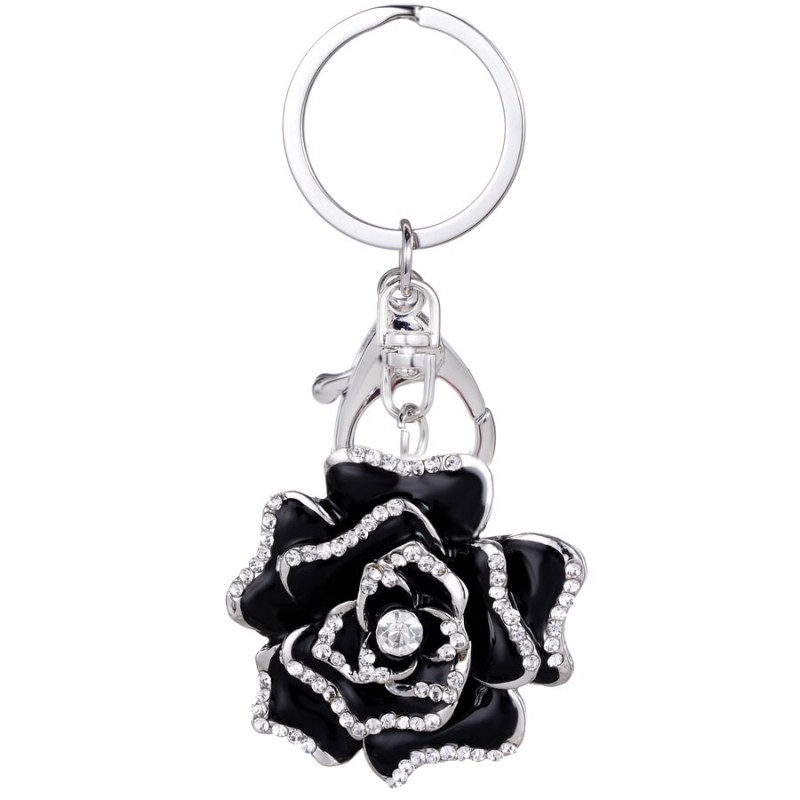 Chaveiro de metal com cristal rosa