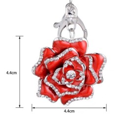 Chaveiro de metal com cristal rosa