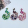 broche de pavão de cristal