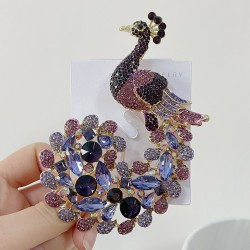 broche de pavão de cristal