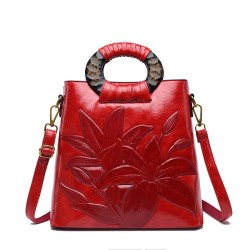 Bolsa de ombro elegante em couro - flores estampadas