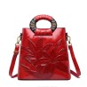 Bolsa de ombro elegante em couro - flores estampadas