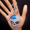 Cabeça de caveira de cristal prateado - chaveiro