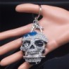 Cabeça de caveira de cristal prateado - chaveiro