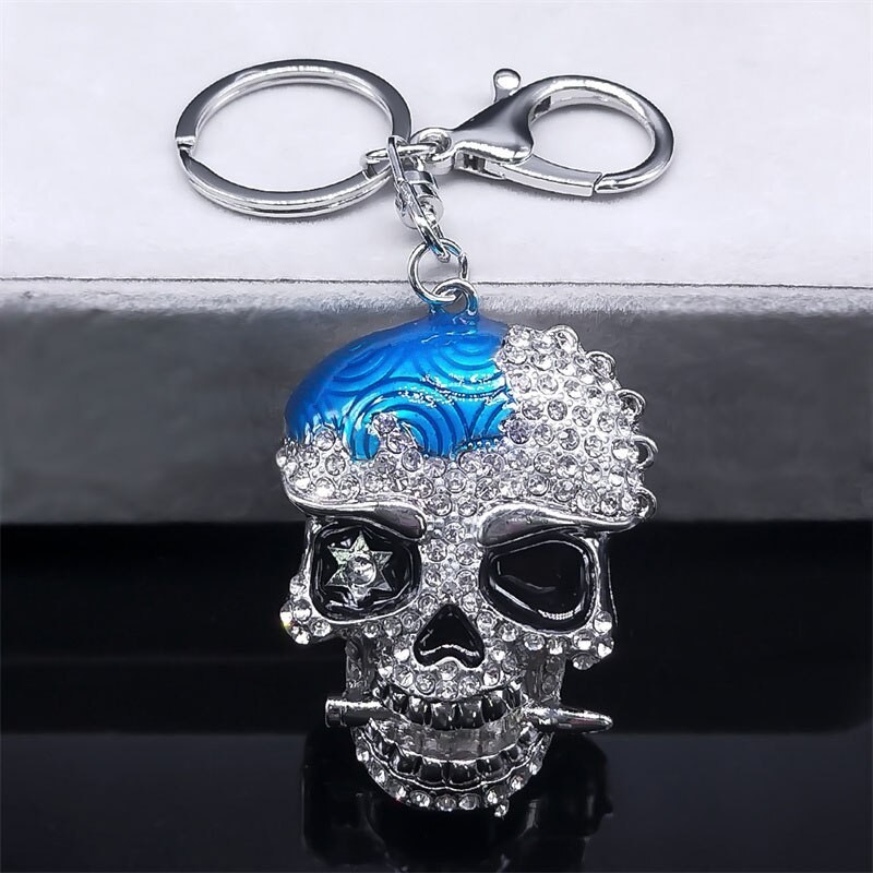 Cabeça de caveira de cristal prateado - chaveiro