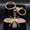 Golden keychain with a crystal beeKeyrings