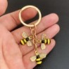 Abelhas de cristal / favo de mel - chaveiro dourado