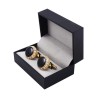 Luxuosas abotoaduras redondas douradas - cristais brancos / esmalte preto