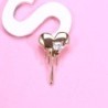 Broche em formato de coração com zircônias
