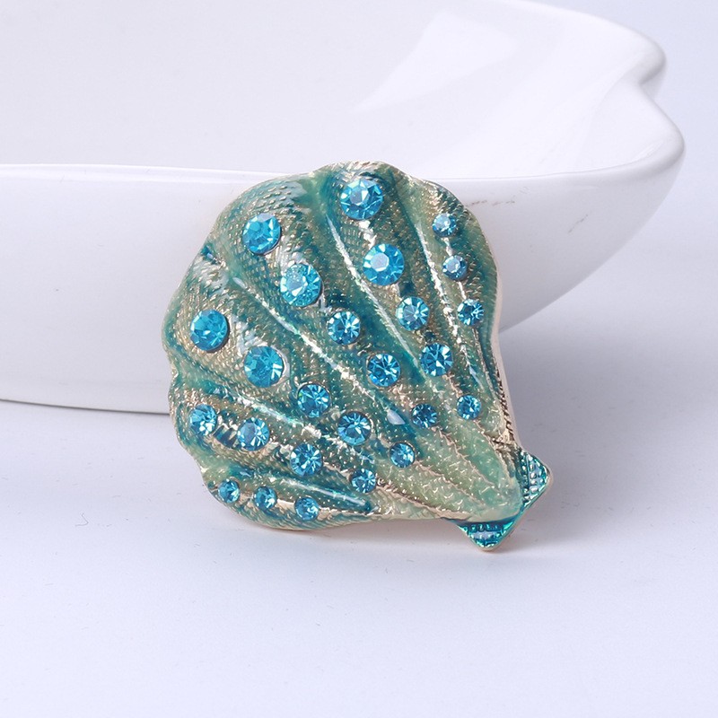 Concha de cristal - broche elegante
