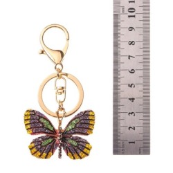 Chaveiro dourado com borboleta de cristal