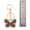Chaveiro dourado com borboleta de cristal