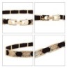 Elegant black elastic belt - with golden metal decorationsBelts