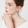 Brincos dourados com topázio cristal azul / strass