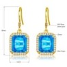 Brincos dourados com topázio cristal azul / strass