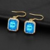 Brincos dourados com topázio cristal azul / strass