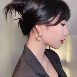 Elegant golden round earrings - with white opalEarrings