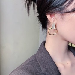 Elegant golden round earrings - with white opalEarrings