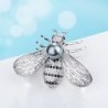 Bee shaped silver brooch - with a pearlBrooches