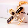 Avião de cristal - chaveiro dourado