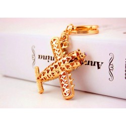 Crystal airplane - gold keychainKeyrings