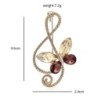 Nota musical com borboleta - broche