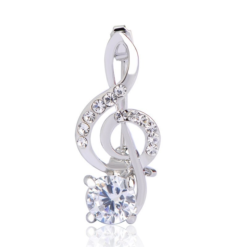broche de notas musicais de cristal