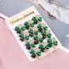 Four crystal green leaves - brooch - 12 pieces setBrooches
