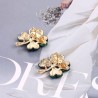 Four crystal green leaves - brooch - 12 pieces setBrooches