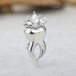 Tooth with a crystal crown - broochBrooches