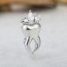 Tooth with a crystal crown - broochBrooches