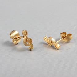 Brincos de notas de música dourada