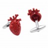 Cufflinks na moda com um coração vermelho