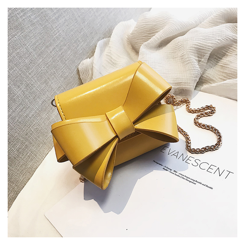 Small elegant bag with bow & chainBags
