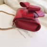 Small elegant bag with bow & chainBags
