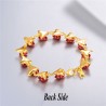 Gold & silver bracelet with red rosesBracelets