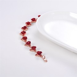 Gold & silver bracelet with red rosesBracelets